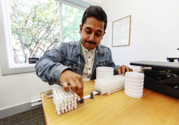 Pani Founder and CEO, Devesh Baharadwaj with a water plant model | Source: Victoria’s Pani tapped to help reduce costs for desalination plants around the world, Times Colonist