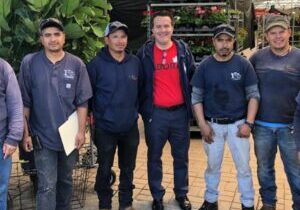 Labora CEO Rene with foreign workers that use Labora